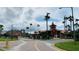 Community entrance with gated access and beautiful landscaping at 2210 Grand Cayman Ct # 1722, Kissimmee, FL 34741