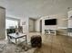 Bright living room with tile floors and dining area at 2210 Grand Cayman Ct # 1722, Kissimmee, FL 34741
