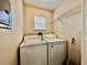 Convenient laundry room with washer and dryer at 2210 Grand Cayman Ct # 1722, Kissimmee, FL 34741