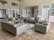 Elegant community lobby with comfortable seating and modern glass-top coffee table at 2210 Grand Cayman Ct # 1722, Kissimmee, FL 34741