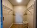 Spacious closet with wire shelving and hanging rods at 2210 Grand Cayman Ct # 1722, Kissimmee, FL 34741