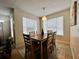 Bright dining area with a table and chairs, perfect for Gathering meals at 2210 Grand Cayman Ct # 1722, Kissimmee, FL 34741