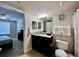 Bathroom with a toilet, sink, and shower at 2210 Grand Cayman Ct # 1722, Kissimmee, FL 34741