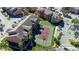 Aerial view of community with tennis court at 2210 Grand Cayman Ct # 1722, Kissimmee, FL 34741