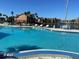 Inviting community pool overlooking a lake at 2210 Grand Cayman Ct # 1722, Kissimmee, FL 34741