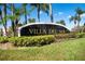 Villa Del Sol community entrance sign at 2210 Grand Cayman Ct # 1722, Kissimmee, FL 34741
