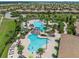 Resort-style pool with multiple pools, a spa, and plenty of lounge chairs at 9099 Hazard St, Davenport, FL 33896