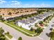 Aerial view of neighborhood with homes and pools at 9099 Hazard St, Davenport, FL 33896