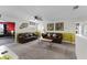 Spacious bonus room with two couches and a coffee table at 9099 Hazard St, Davenport, FL 33896