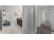 Clean bathroom with dark vanity and tiled floors at 9099 Hazard St, Davenport, FL 33896