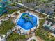 Fun kiddie pool with water features and lounge chairs at 9099 Hazard St, Davenport, FL 33896
