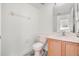 Simple half bathroom with single vanity and toilet at 1746 Pompano Dr, Poinciana, FL 34759