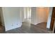 Living Room with grey vinyl flooring and access to other rooms at 3727 Lake Orlando Pkwy # 4, Orlando, FL 32808