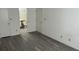Bright bedroom with grey vinyl flooring and an ensuite bathroom at 3727 Lake Orlando Pkwy # 4, Orlando, FL 32808