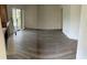 Spacious living room featuring new flooring and a fireplace at 3727 Lake Orlando Pkwy # 4, Orlando, FL 32808