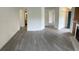 Open living area showcasing new flooring and access to other rooms at 3727 Lake Orlando Pkwy # 4, Orlando, FL 32809