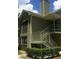 Two-story building with a staircase and screened porch at 3727 Lake Orlando Pkwy # 4, Orlando, FL 32808