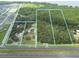 Four wooded lots near a highway and residential area at 6365 Whip O Will E Ln, St Cloud, FL 34771