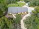 Aerial view of brick house with large yard at 6365 Whip O Will E Ln, St Cloud, FL 34771