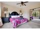 Main bedroom with king bed and mirrored closet at 901 Charo Pkwy # 721, Davenport, FL 33897