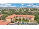 Aerial view of community, showcasing building exteriors and parking at 901 Charo Pkwy # 721, Davenport, FL 33897