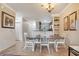 Bright dining room adjacent to kitchen and living room at 901 Charo Pkwy # 721, Davenport, FL 33897