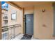 Inviting entryway with a gray door and a welcome mat at 901 Charo Pkwy # 721, Davenport, FL 33897