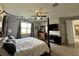 Bright bedroom with a king-size bed and ceiling fan at 2321 Hinsdale Dr, Kissimmee, FL 34741