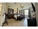 Bright bedroom with a king-size bed and ceiling fan at 2321 Hinsdale Dr, Kissimmee, FL 34741