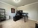 Home office with large desk, two monitors and storage at 2321 Hinsdale Dr, Kissimmee, FL 34741