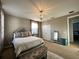 Spacious bedroom with large window and a comfortable bed at 2321 Hinsdale Dr, Kissimmee, FL 34741