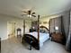 Bright bedroom with a king-size bed and ceiling fan at 2321 Hinsdale Dr, Kissimmee, FL 34741