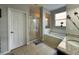 Bathroom with soaking tub, walk-in shower, and granite countertop at 2321 Hinsdale Dr, Kissimmee, FL 34741