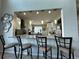 Kitchen features a breakfast bar with seating and modern finishes at 2321 Hinsdale Dr, Kissimmee, FL 34741