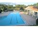Relaxing community pool with a pool house and lake view at 1034 Chalcedony St, Kissimmee, FL 34744