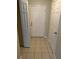 Inviting entryway with tile flooring and storage closet at 1034 Chalcedony St, Kissimmee, FL 34744