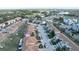 Aerial image showcasing a residential neighborhood with houses and street views at 1034 Chalcedony St, Kissimmee, FL 34744