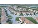 Community overview showcasing numerous townhouses at 1034 Chalcedony St, Kissimmee, FL 34744
