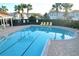 Community pool with lounge chairs and patio area at 1034 Chalcedony St, Kissimmee, FL 34744