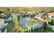 Community pool with a covered patio area and plenty of lounge chairs at 1034 Chalcedony St, Kissimmee, FL 34744