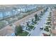Aerial view of townhouses and apartment buildings, showcasing a residential area at 1034 Chalcedony St, Kissimmee, FL 34744