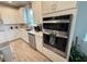 Well-equipped kitchen with double oven and stylish cabinetry at 5652 Arborvista Dr, Saint Cloud, FL 34771
