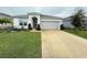 House exterior with well-manicured lawn at 5652 Arborvista Dr, Saint Cloud, FL 34771