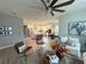 Open living space with a view into the kitchen and breakfast area at 5652 Arborvista Dr, Saint Cloud, FL 34771
