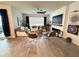 Bright living room with hardwood floors, fireplace, and comfortable seating at 5652 Arborvista Dr, Saint Cloud, FL 34771