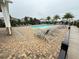 Community pool with plenty of lounge chairs at 5652 Arborvista Dr, Saint Cloud, FL 34771