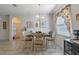 Charming dining area with a table and chairs, adjacent to the kitchen at 226 Brunswick Dr, Davenport, FL 33837