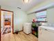 Laundry room with washer, dryer, and extra storage at 4155 Quail Wood Dr, St Cloud, FL 34772