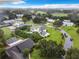 Aerial view of the house and surrounding neighborhood at 4155 Quail Wood Dr, St Cloud, FL 34772