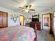 Bright bedroom with a queen-size bed and built in closet at 4155 Quail Wood Dr, St Cloud, FL 34772